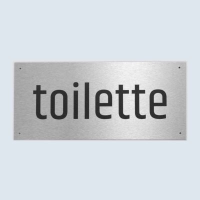 Rechteckiges Metallschild mit schwarzer Aufschrift „toilette“.